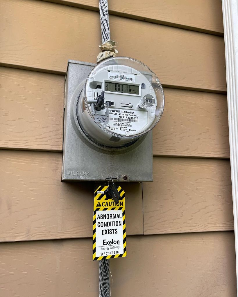 Old meter with caution tag